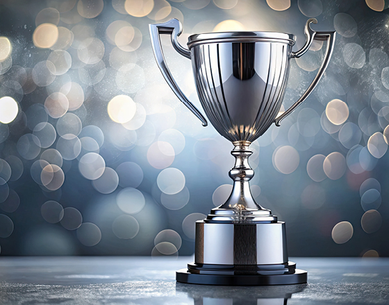 Silver trophy with glimmering background