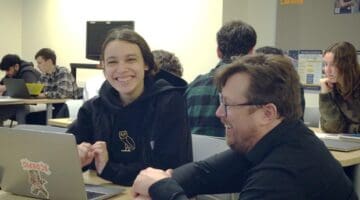 FYS instructor and student in the classroom.