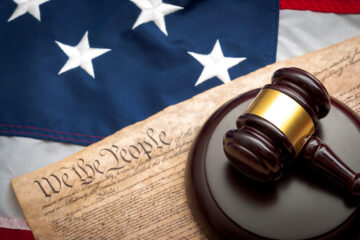 United States constitution and judge's gavel on top of American flag