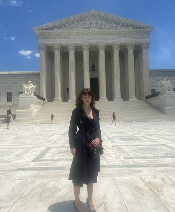 Student Juniper Frost in front of Supreme Court