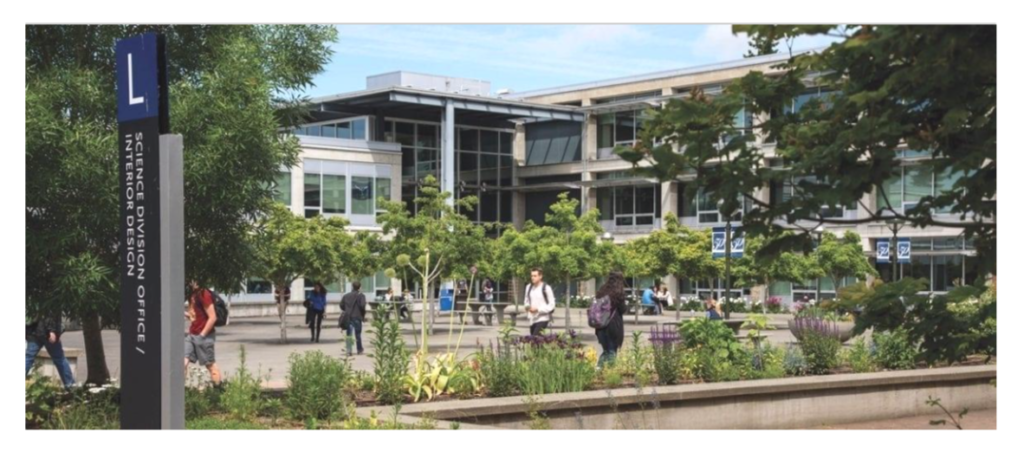 photograph of Bellevue College campus, students walking to and from class