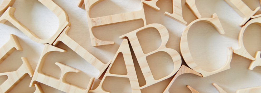 image of the alphabet made of wooden letters