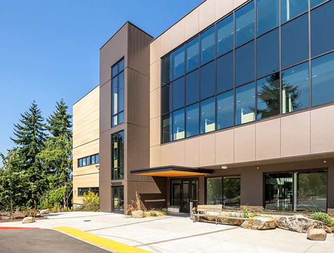 A sleek, modern looking building with large windows.