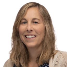 profile headshot of Betsy Zahrt Geib smiling