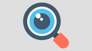 icon of magnifier with eyeball in the middle