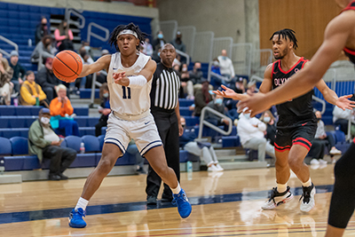 A BC Bulldog basketball player receives a pass.