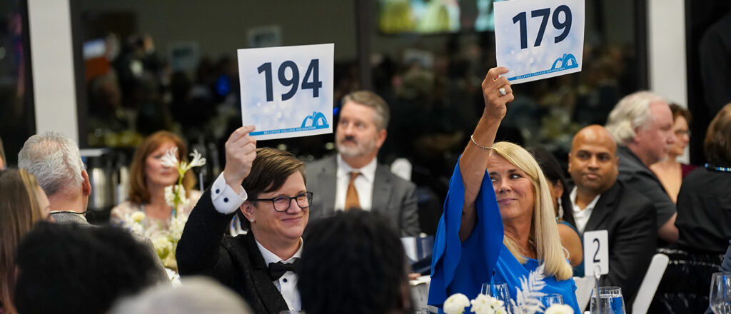 Bids are raised at the Foundation Gala fundraiser.