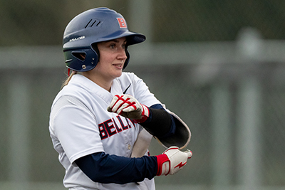 A BC Bulldog softball player surveys the field.