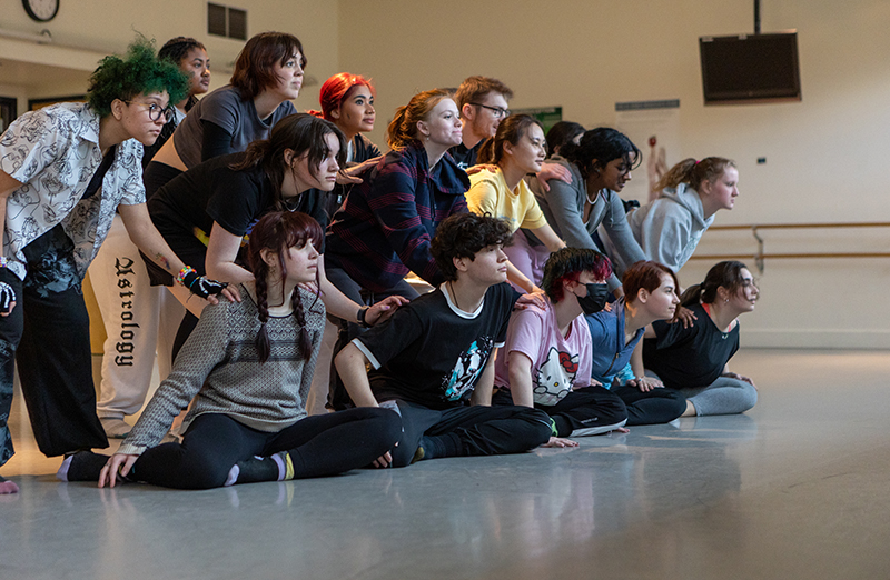 Modern dance students in formation.