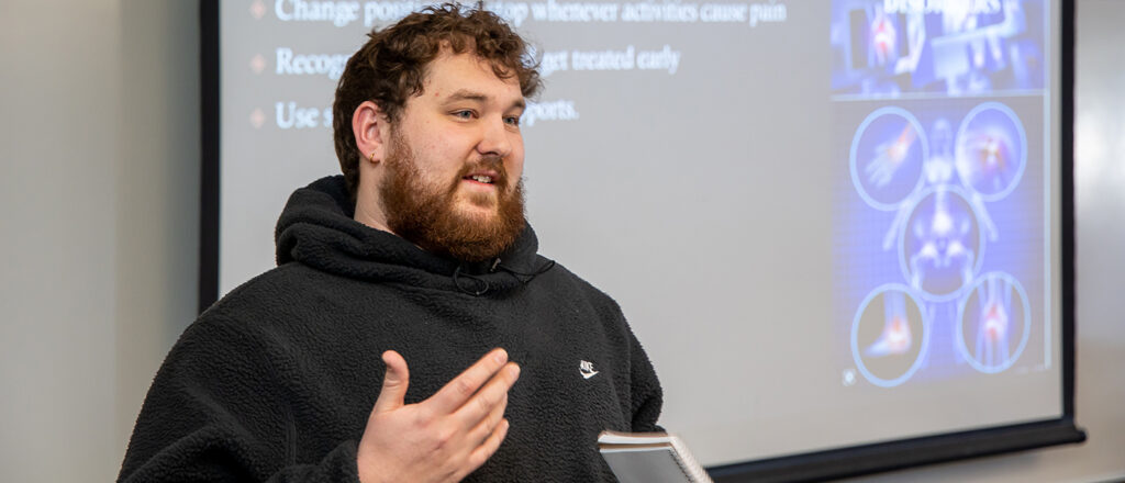 A student gives a class presentation.