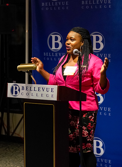 A scholarship recipient speaks from the podium at the Donor Scholar Reception.