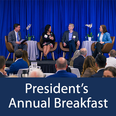 Dr. May and three panelists at 2024 Annual Breakfast event