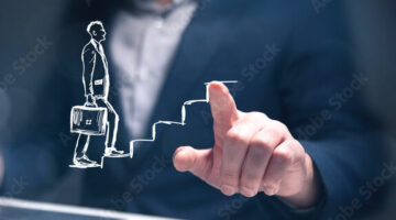A person pointing at the camera which leads to a graphic of a person with a brief case going up some stairs