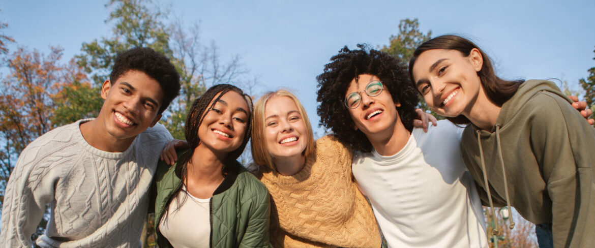 Image of students smiling.