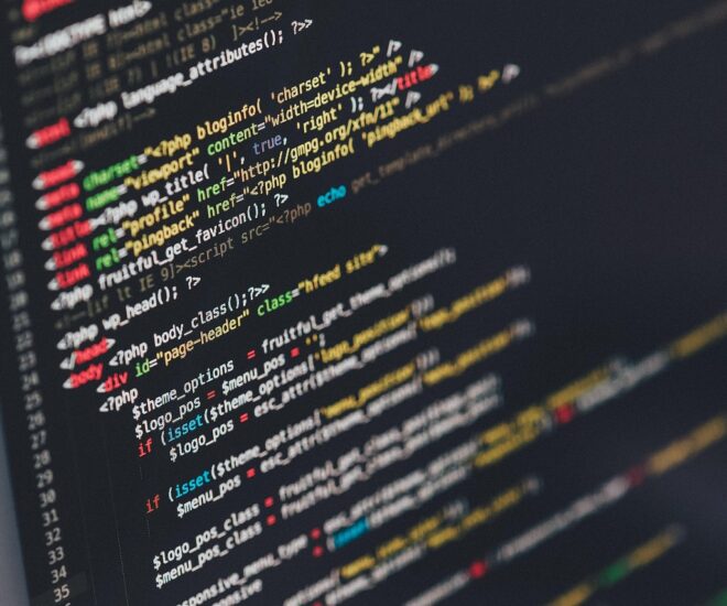 Black computer screen with unidentified computer code on screen