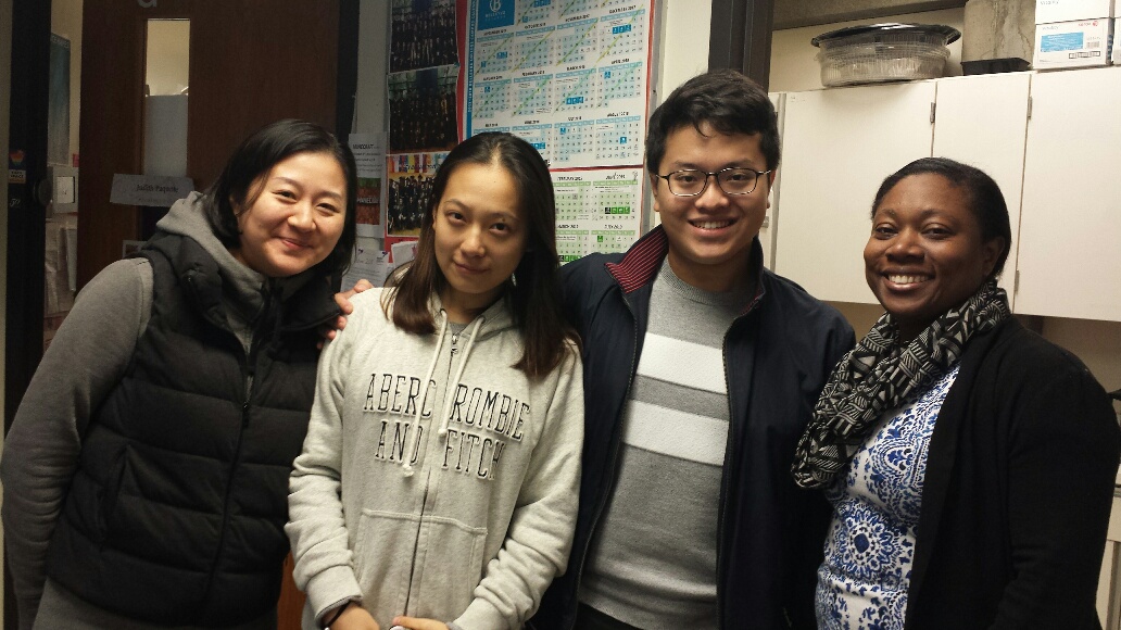 Four smiling students