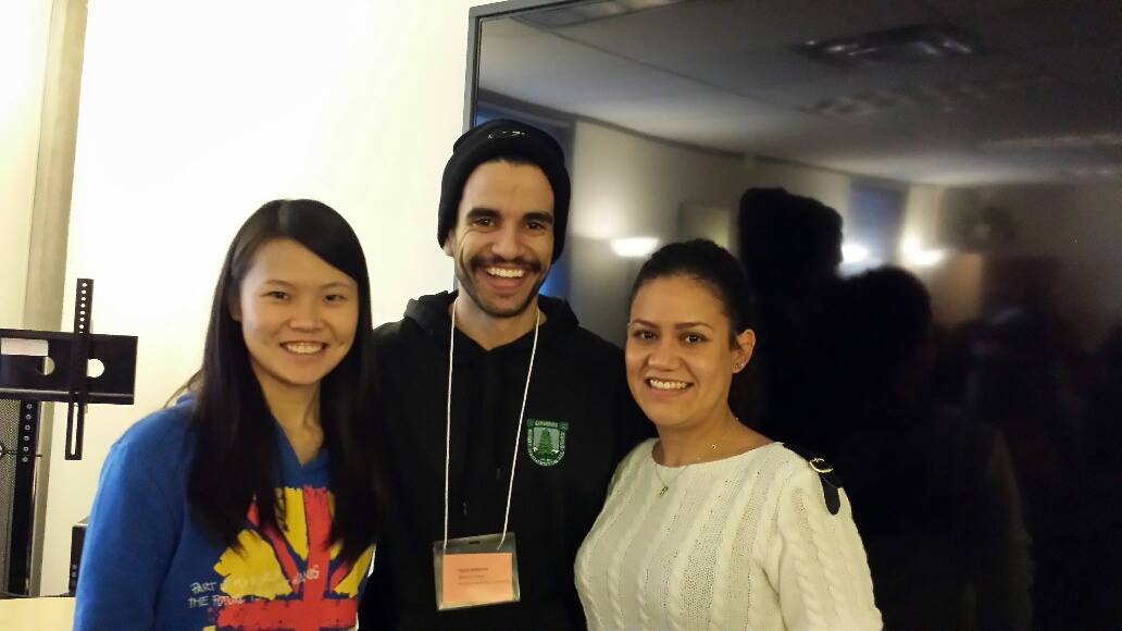 Three smiling students