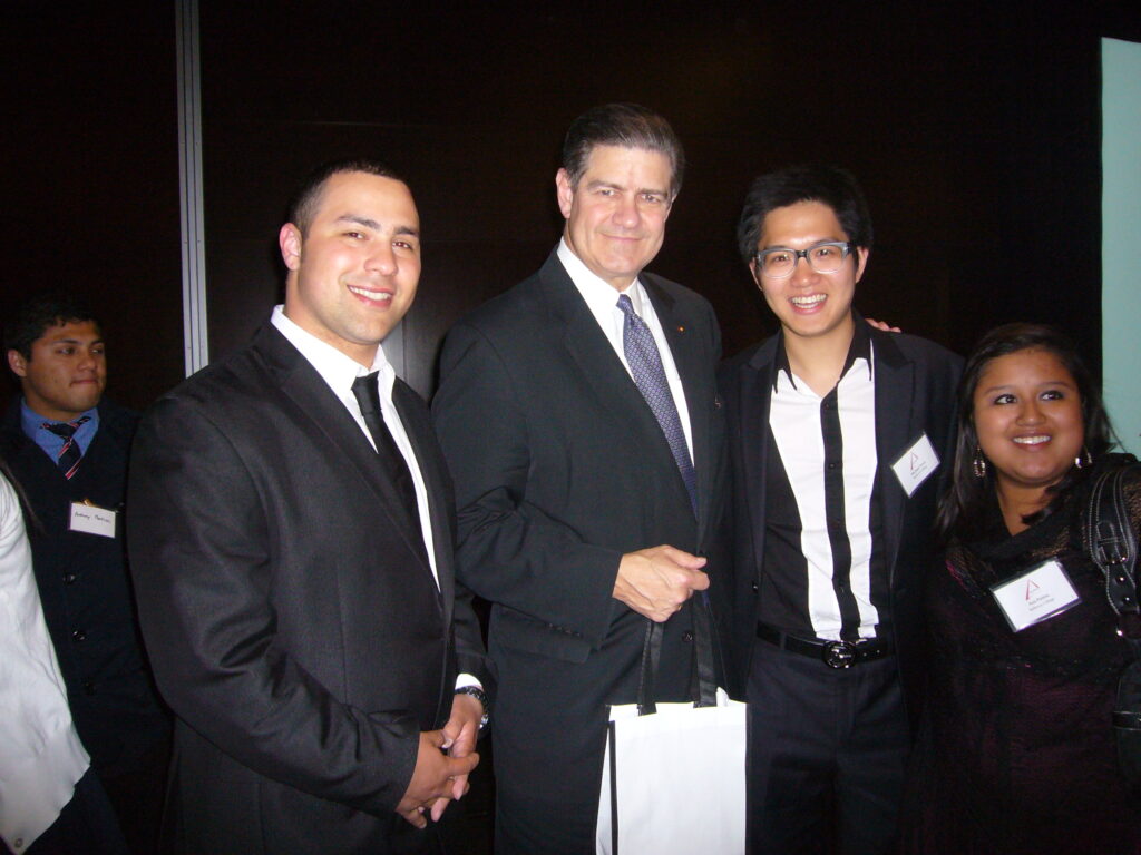 Students and EY CEO James Turley