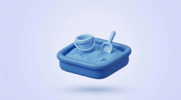 3D icon of a sandbox with a bucket and shovel, representing exploration and hands-on learning