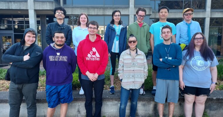 OLS students standing outside a campus building