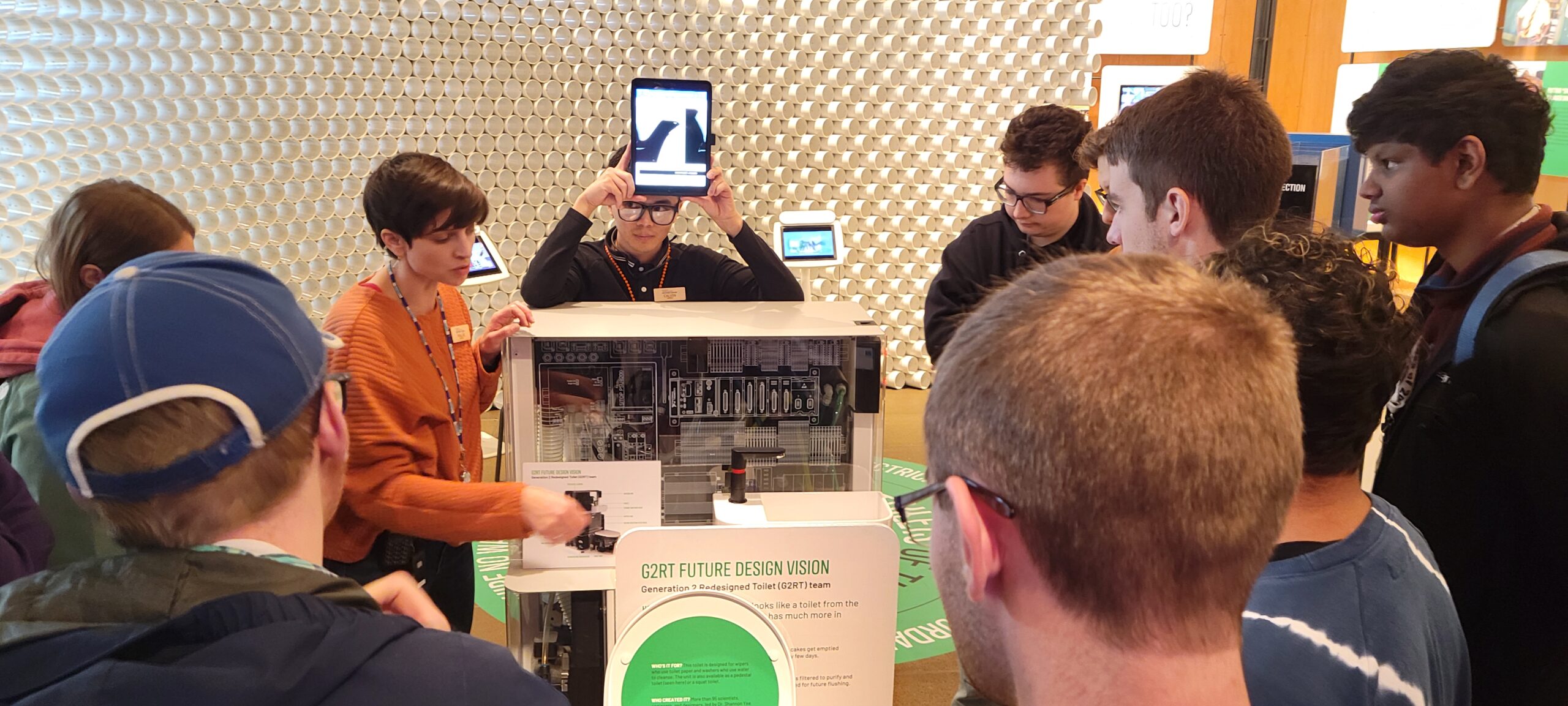 OLS Students listen to a presentation at the Bill & Melinda Gates Foundation exhibit