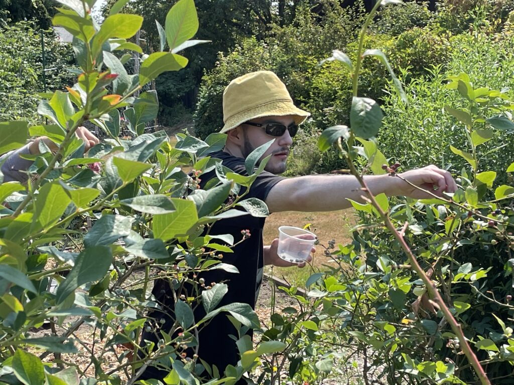 OLS student working in garden