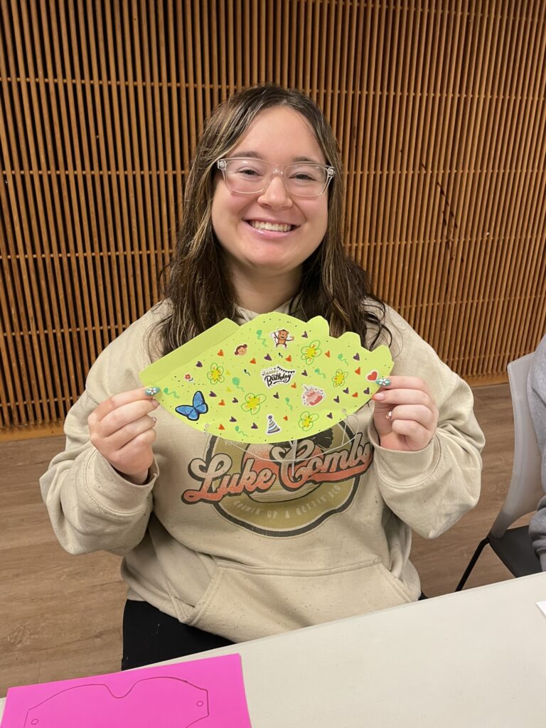 OLS students making party hats and games for their fall service learning project