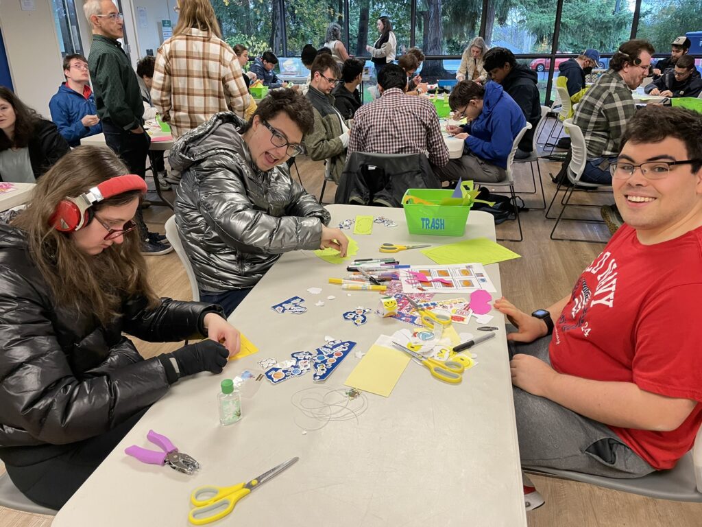 OLS students making party hats and games for their fall service learning project