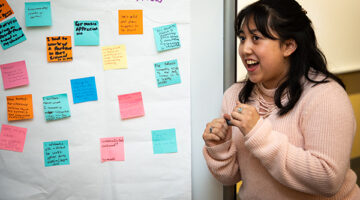An OLS student gives a presentation in class.