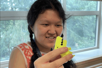 An OLS student participates during summer camp.