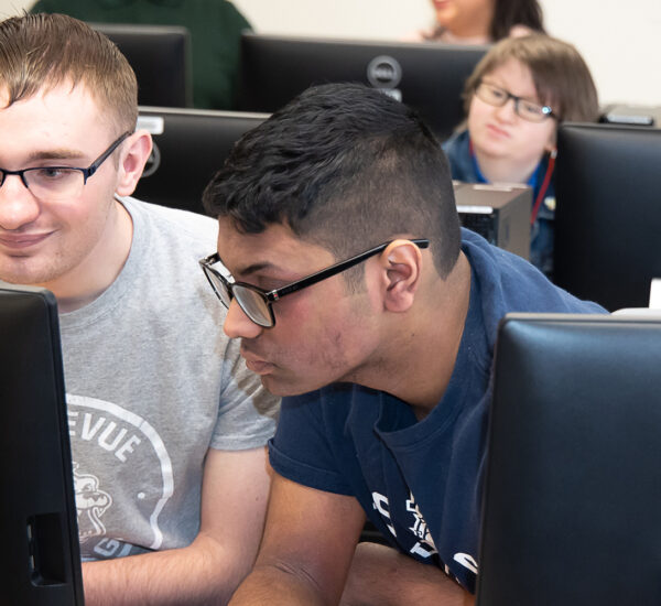 OLS students collaborate in class.