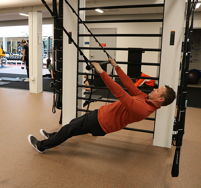 A student works out in BC's Fitness Center.