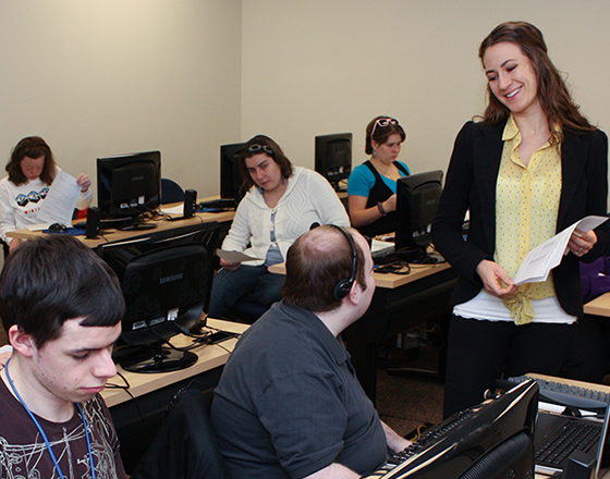Students and faculty interact in class.