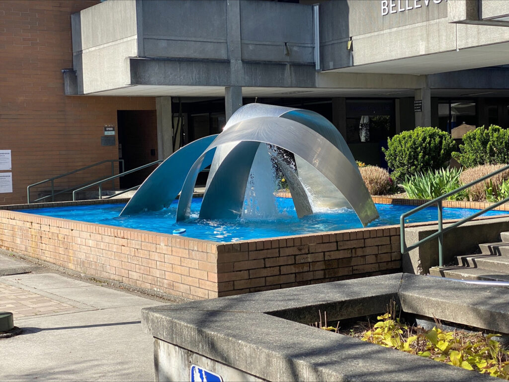 The fountain on Bellevue College's campus, in the sun.