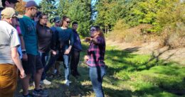 OLS Students learn about safe salmon practices outside on the BC campus