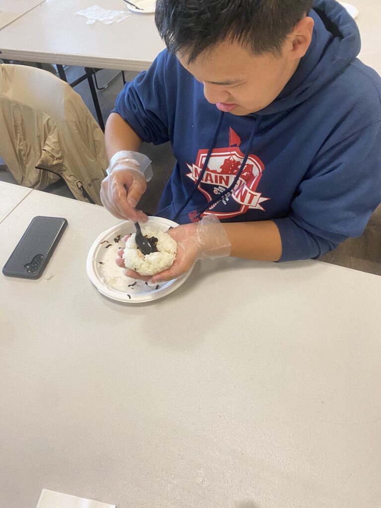 OLS student participates in rice making workshop