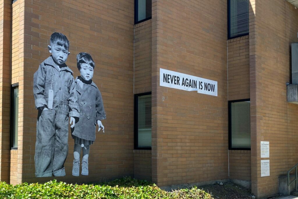 close cropped image of mural Never Again is Now by Erin Shigaki at Bellevue College