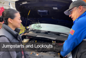 Officer and Student in front of car with open hood white text reads Jumpstarts and lockouts