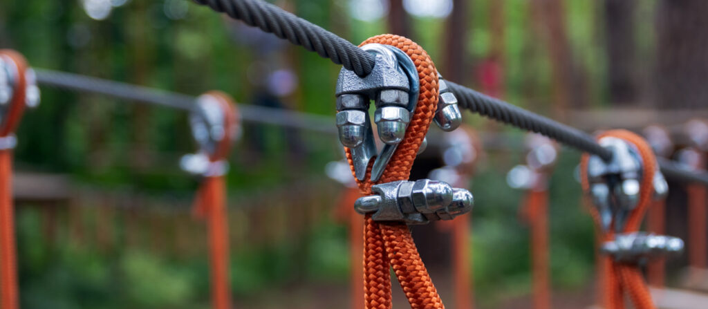 Rope holding a log bridge, part of the cableway. Close-up.