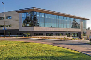 Bellevue College's campus, highlighting the U building on a sunny day