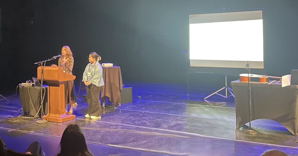 Kate Schwendiman and Nattira Chaiprasit introduce the audience to an alternative musical notation system at the UW Undergraduate Research Symposium, 2026.