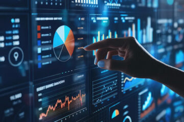Hand pointing at a digital dashboard displaying charts and analytics.