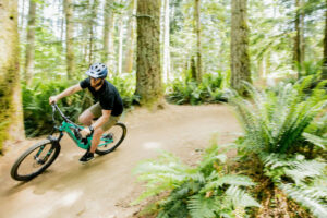 Mountain biker on a dusty trail at Duthie Hill