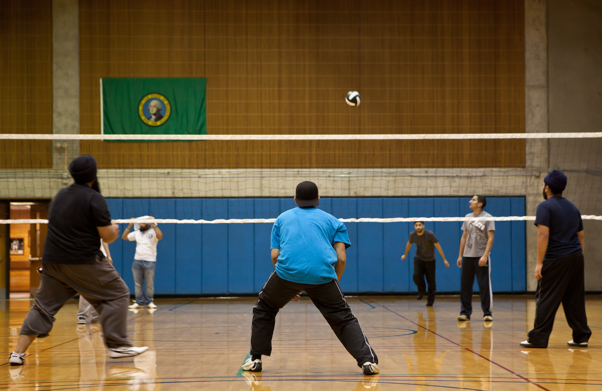 Male students playing volleyball