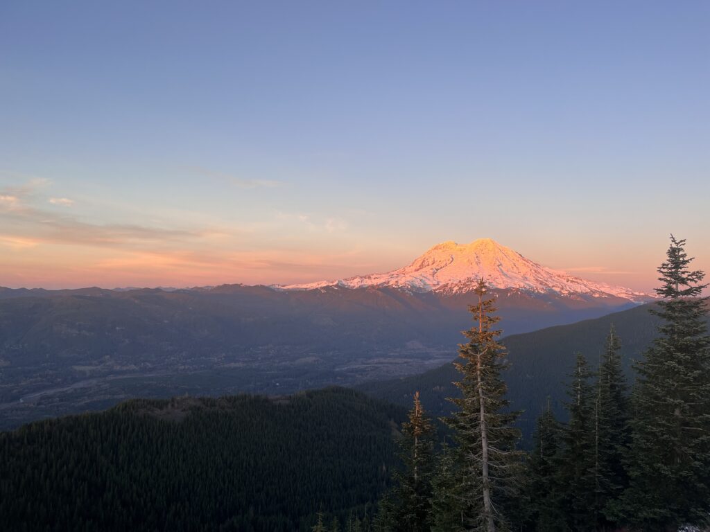 Evening sunset over Mt Rainier from a hiker hut.