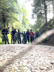 Group photo with mountain bikes on the Olallie Trail.