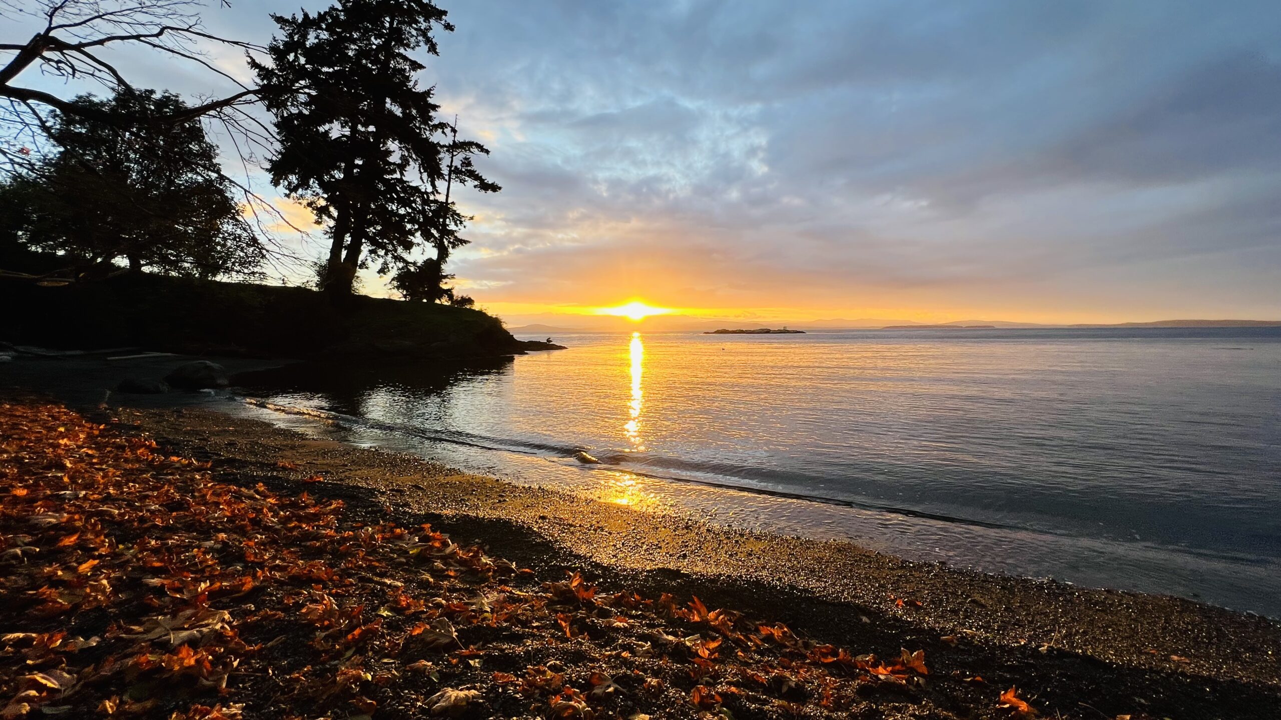 Sunset in Haro Strait viewed from Roche Harbor during a San Juan Island bike tour.