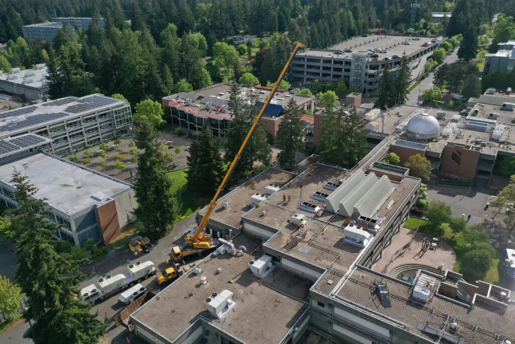 Aerial shot of buildings with crane. 