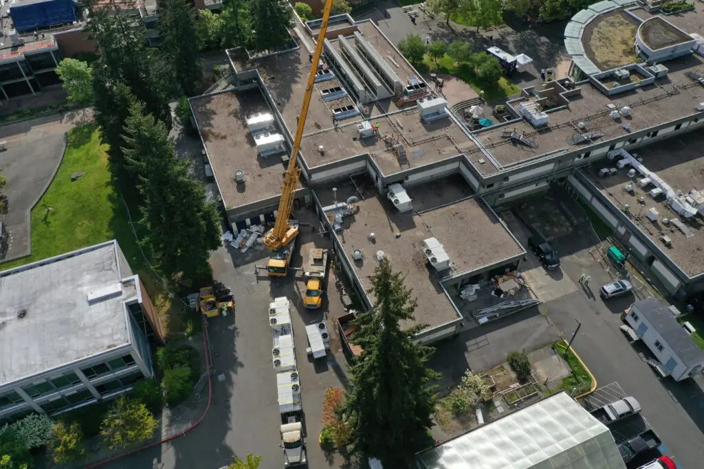 Aerial shot of buildings with crane. 
