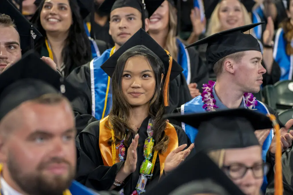 Soon-to-be Bellevue College alumni attend graduation ceremonies.
